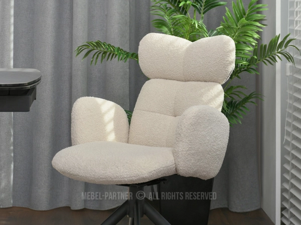Wygodne i nowoczesne tapicerowane krzesło boucla - komfort spędzania czasu